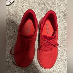 Crimson athletic shoes that slip on